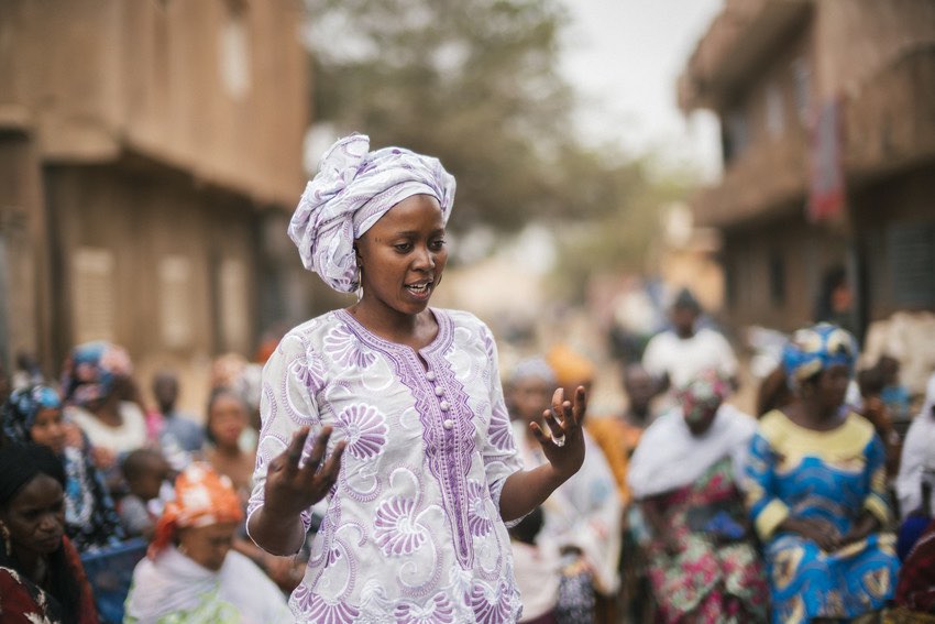 A member of the women's advocacy group Nieta in western Mali speaks out against early marriage.